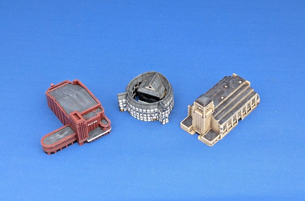 Three very small scale model buildings - a cinema, theatre and radio station