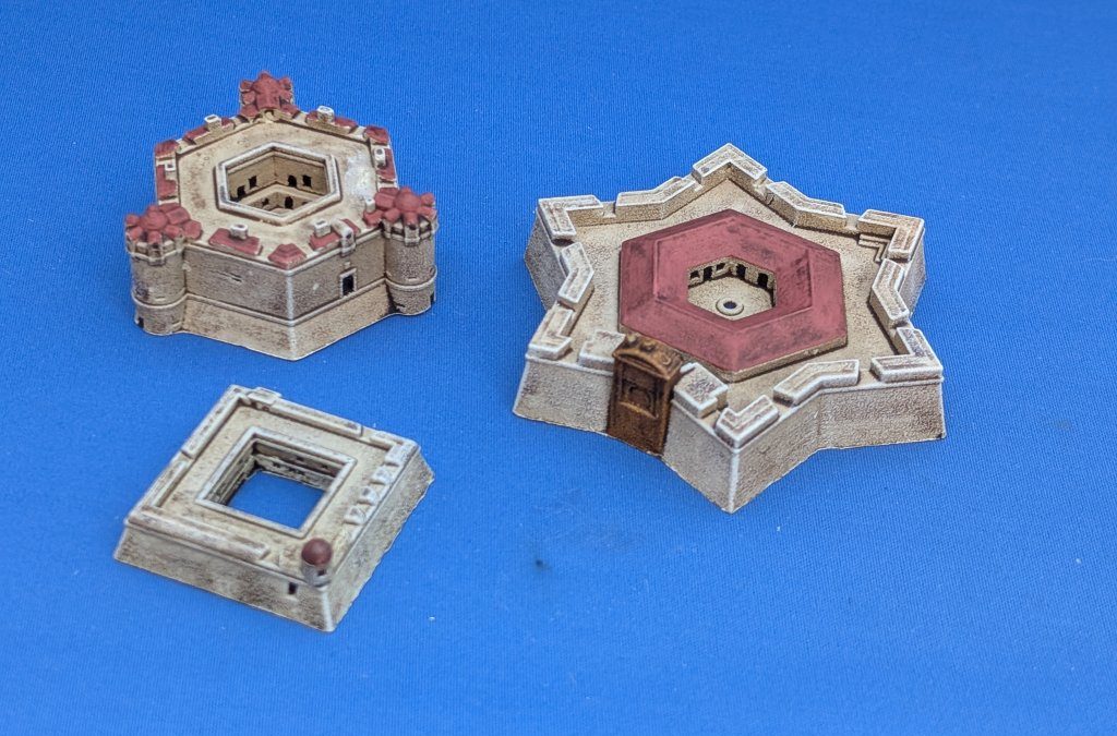 Three 1/700th scale models of fortresses